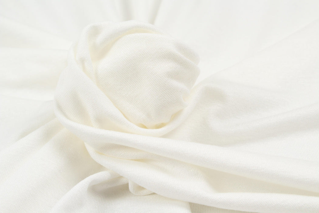 7 Mts Roll - EcoVero™ Viscose Single Jersey (Off white) OFFER: 7€/Mt-Roll-FabricSight