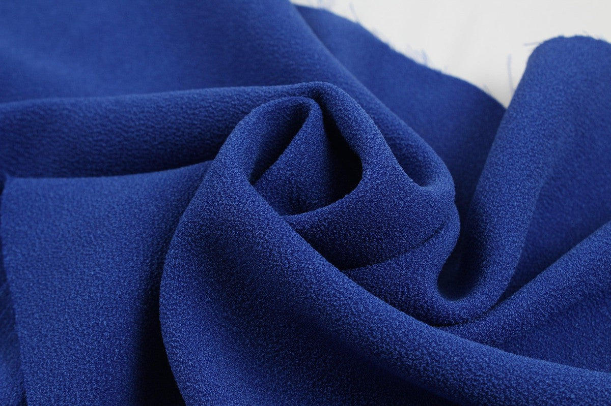 Double Crepe of Polyester and Acetate Blue Buy Fabrics Online