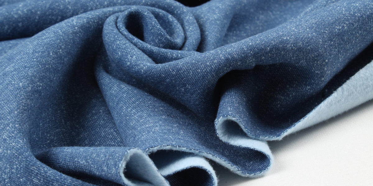 https://www.fabricsight.com/cdn/shop/files/Double-Face-Tone-on-Tone-Brushed-Fleece-5-Colors-Available-Roll-fabricsight-Meters-Blue_1200x600_crop_center.jpg?v=1709166278