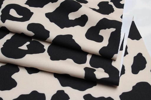 swatch-High Compression Interlock Fabric – Stretch Performance Knit – Leopard Print-Fabric-FabricSight